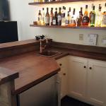 Custom bar with reclaimed redwood.